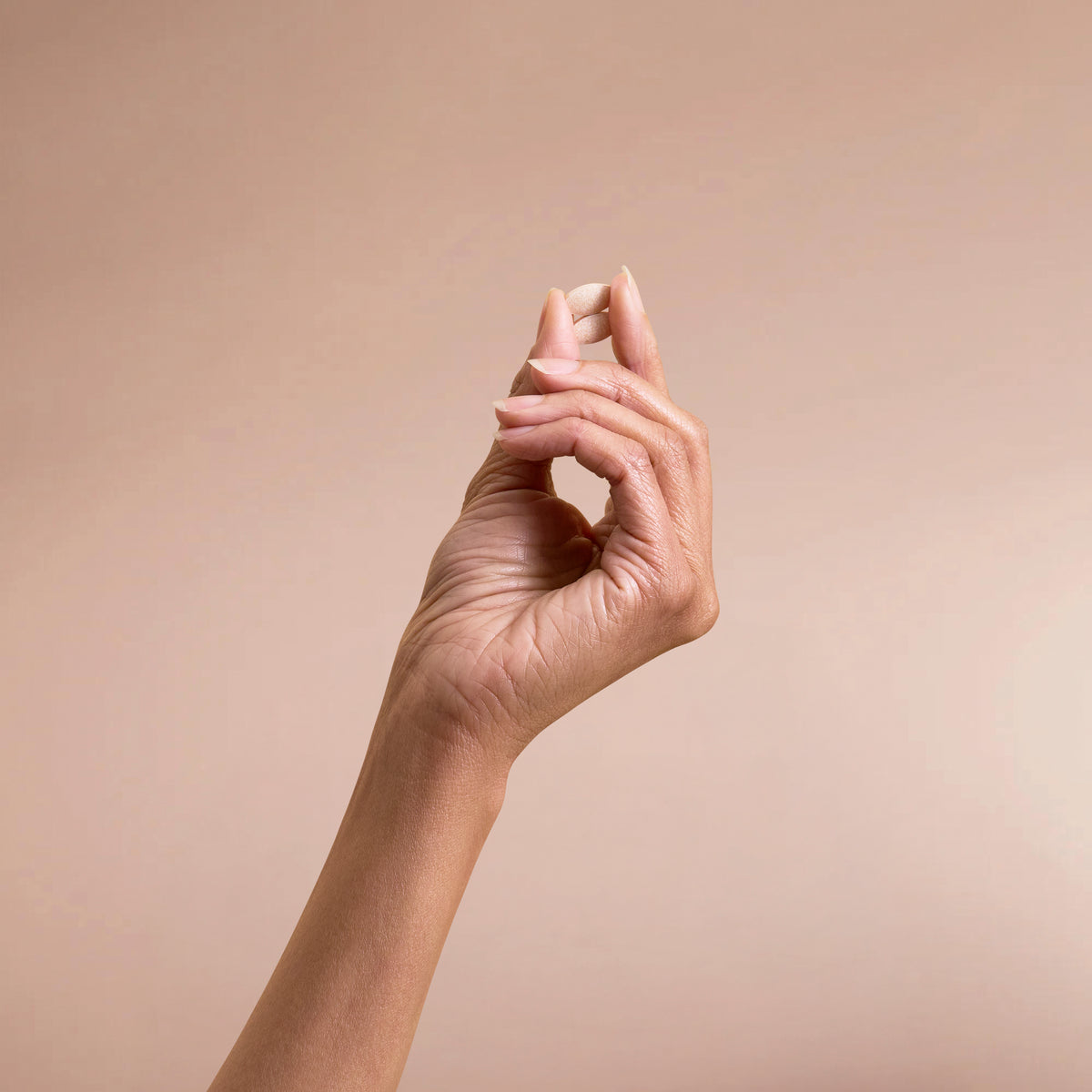 A tablet held in a hand
